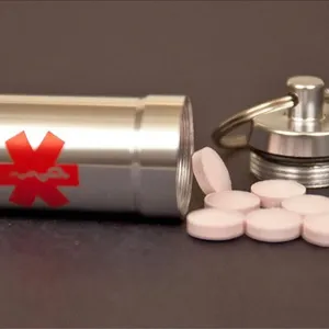 Portable aluminum pill holder with keychain, waterproof emergency capsule pill box container.