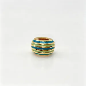 Gold plated metal bead with blue green enamel stripes, European DIY charm spacer accessory.