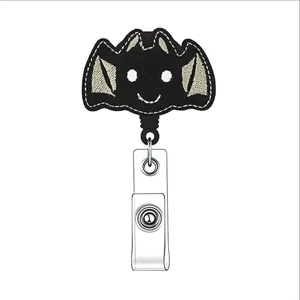 Halloween bat badge reel with retractable cord and clear strap clip. Perfect office accessory.