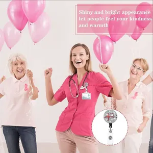 Retractable rhinestone heart EKG nurse badge reel with smooth rotation and secure clip.