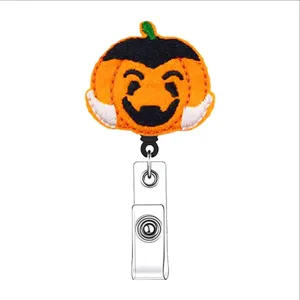 Halloween vampire pumpkin badge reel retractable felt ID card holder for nurse office worker close up