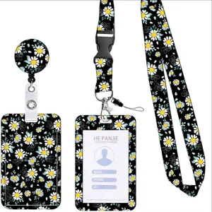 Set di cordino porta badge retrattile con design a motivo di margherite floreali nere.
