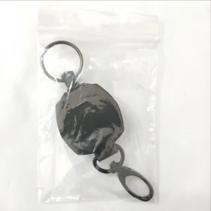 Heavy duty black retractable badge reel with keyring and lobster clasp in clear bag.