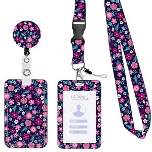 Set porta badge retrattile con stampa floreale e porta carte con cordino per uso in ufficio.