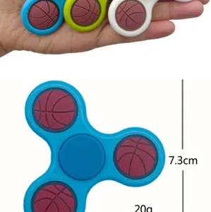Close-up detail view of a colorful basketball fidget spinner, showing size and weight specs.