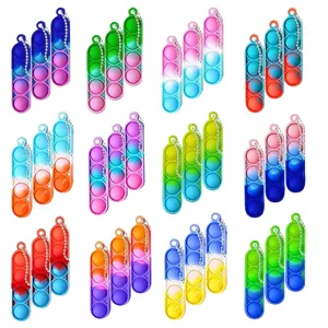 Mini Silikon Push Pop Bubble Fidget Schlüsselanhänger, bunte Anti-Stress Spielzeug Sets.