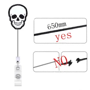 Detailed view of retractable badge reel showing 650mm cord length and quality check.