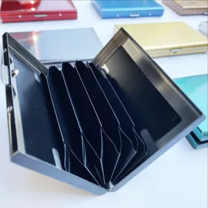 Detailed view of stainless steel credit card holder with accordion slots for easy organization.
