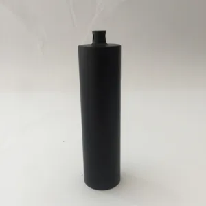 Detail view of the black aluminum waterproof capsule, showing the multi-compartment thread design.