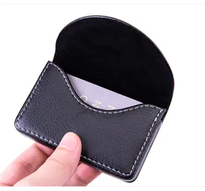 Black leather magnetic business card holder semi-circular pocket card case for office.