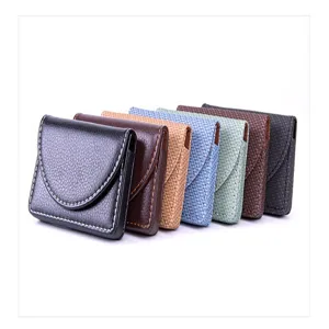 Detail view of the colorful leather magnetic business card holders in clean white display.