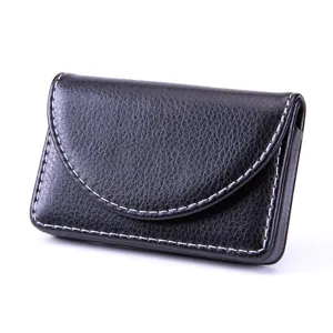 Black leather business card holder with magnetic closure and white stitching for professional.