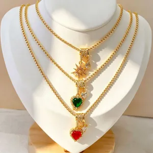 Detailed view of multi-layer gold plated necklace with heart and star crystal pendants.