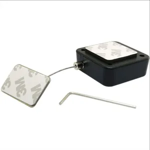 Retractable steel wire anti-theft cable box with 3M adhesive pad and hex wrench tool.