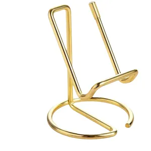 Minimalist gold metal phone stand desktop display holder for office desk and home decor use.
