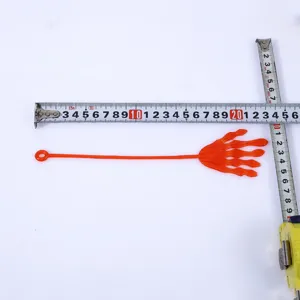 Stretchy sticky skeleton hand toy, funny prank novelty toy with flexible grip for fun.