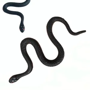 Faux serpent en caoutchouc noir pour blague d'Halloween, design réaliste avec yeux rouges.