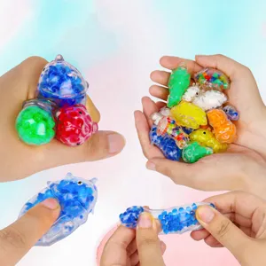 Dinosaur water bead squeeze toy detail, soft silicone sensory stress relief toy with colorful beads.