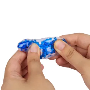 Detail view of a cute dinosaur shape water bead squeeze toy for stress relief and fun play.