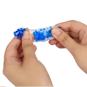 Close-up detail view of the cute dinosaur water bead squeeze toy, soft stretchable stress relief.