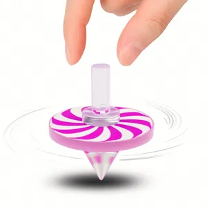 Detailed close-up of a vibrant pink and white swirl acrylic spinning top toy in motion.
