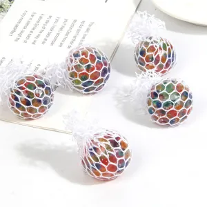 Pallina antistress colorata a rete, giocattolo in morbido TPR da spremere per relax.