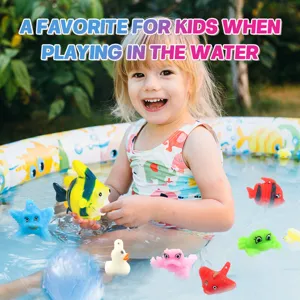 Children playing in water with TPR soft rubber floating fish and sea animal toys.