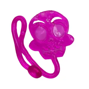 Halloween stretchy sticky skull toy, purple translucent decompression wall crawler fidget play.