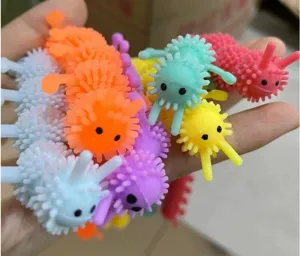 Colorful stretchy caterpillar fidget toys detail view, soft TPR rubber sensory stress relief items.