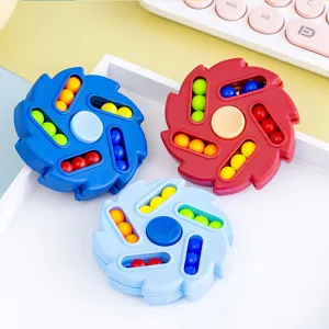 Jouet puzzle magique haricot fidget, toupie rotative double face pour enfants et adultes.