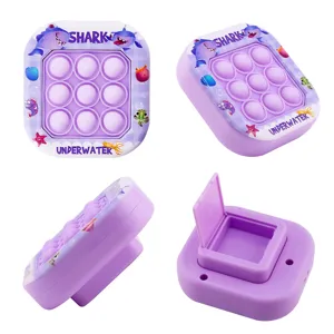 Lila Plastik Pop It Dekompression Spielzeug mit Hai Motiv, tragbares Anti Stress Geschenk.