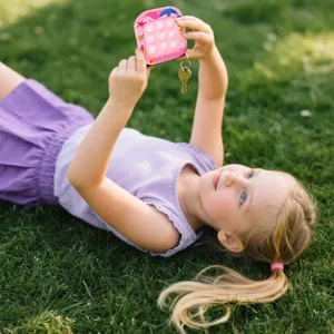 Mini rosa quadratischer Pop It Fidget Toy Schlüsselanhänger Blasen sensorisches Spielzeug
