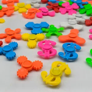 Plastic mini fidget spinner bulk toy assortment, various colorful shapes for kids wholesale.