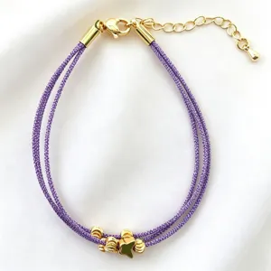 Bracciale multistrato intrecciato viola fatto a mano con perline di metallo dorato donna