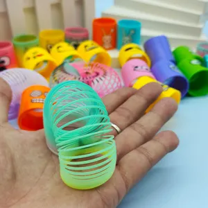 Buntes Plastik Regenbogenfeder Spielzeug, lustige Smiley Magische Feder für Kindergeschenke Party.