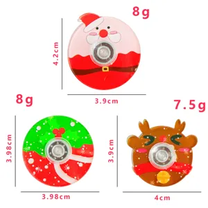 Close-up detail of Christmas finger spinners showing dimensions, cute Santa and reindeer designs.