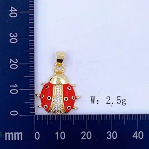 Gold-plated red enamel ladybug pendant with crystal stones, DIY craft jewelry accessory making.