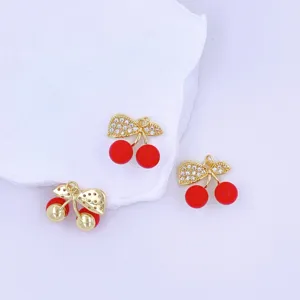 Exquisite red cherry DIY charm pendants with crystal leaves and gold finish for fashion earrings.