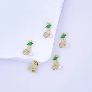 Gold-plated cherry pendant charm with micro-paved zirconia, green leaf stones, and pearl accent.