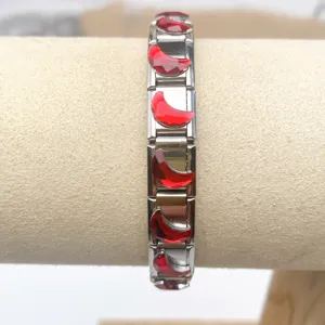 Stainless steel modular charm bracelet with red crystal moon links DIY jewelry accessory.