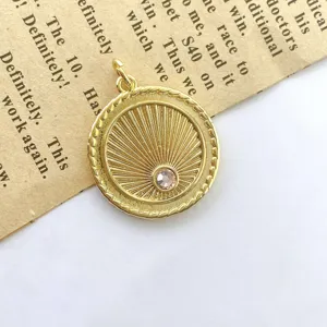 Exquisite vintage gold round sunburst pendant necklace accessory featuring pink crystal.