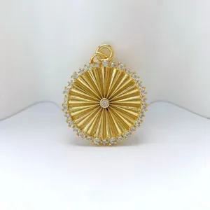 Gold sunburst rhinestone pendant detail, shimmering zirconia stones, elegant jewelry accessory DIY.