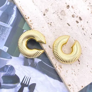 Chunky gold-plated C-shaped ear cuffs with exquisite textured ribbed design, stylish retro jewelry.