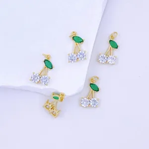 Gold plated cherry charm with cubic zirconia, exquisite DIY jewelry accessory detail view.