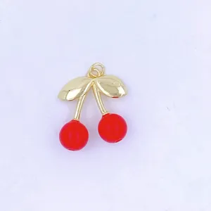 Detailed close-up view of the gold-plated red cherry charm pendant for DIY crafting accessories.