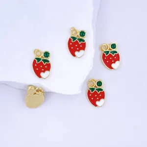 Exquisite strawberry pendant charm with red enamel and cute white heart detail accessories.