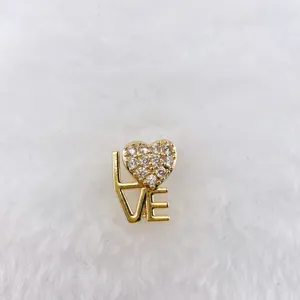 Gold-plated LOVE heart rhinestone charm detail, delicate DIY jewelry accessory for bracelet.