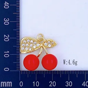 Exquisite gold-plated red cherry pendant with sparkling cubic zirconia leaves and detailed size.