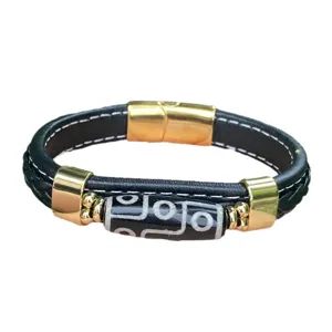 Men vintage leather braided bracelet with gold metal clasp and central dzi bead main view
