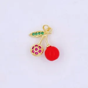 Exquisite cherry pendant detail, golden frame with green and pink zirconia and red enamel bead.
